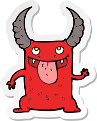 sticker of a cartoon devil