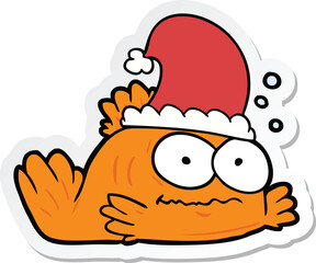 sticker of a cartoon goldfish wearing xmas hat