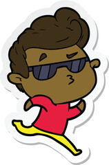 sticker of a cartoon cool guy