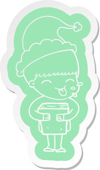cartoon  sticker of a boy wearing santa hat
