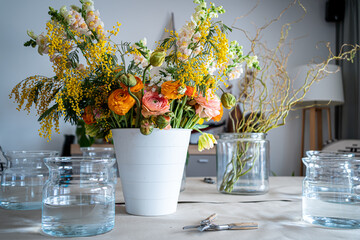 Flowers in vases for a master class on bouquets