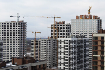 construction site with crane.  construction of muitistrey houses