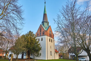 Fototapeta na wymiar Typical old church in Sievershausen near Lehrte, in Lower Saxony, Germany, 
