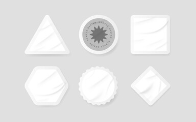 Stickers mockup. Set of realistic white labels of different shapes with crumpled wrinkles. Blank sticky geometric patches for tags or labels. Vector illustration
