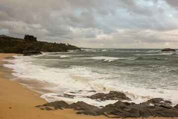 cloudy sky and waves in the Cantabrian coast