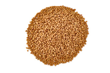 Buckwheat grains, isolated on white background.