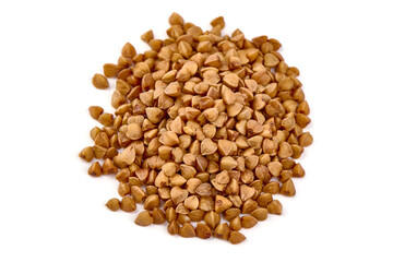 Buckwheat grains, isolated on white background.