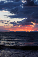 beautiful sunset with thunderclouds over the Mediterranean sea of Turkey.