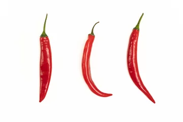 Fotobehang Hot red peppers isolated on white. © Olena