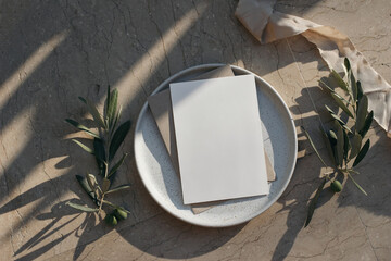 Summer branding, wedding stationery. Blank greeting card, invitation mock up on plate. Beige marble...