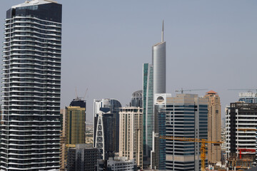 Obraz na płótnie Canvas View on Dubai Marina skyscrapers and the most luxury superyacht marina,Dubai
