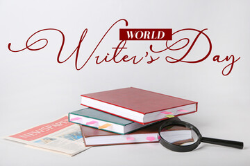 Banner for World Writer's Day with books and newspaper