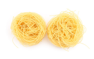 Raw pasta nests on white background