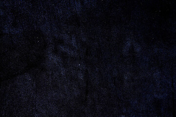 Stars at night with backlit trees