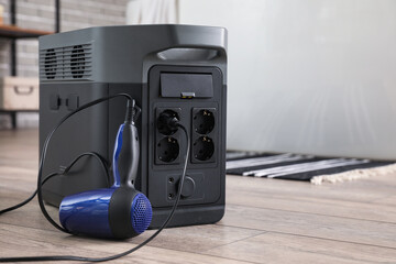Portable power station with hair dryer in bathroom