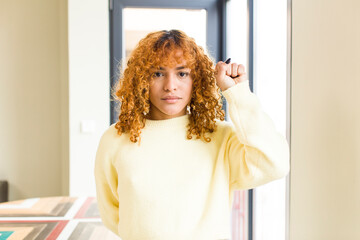 young red hair latin pretty womann at new cool home