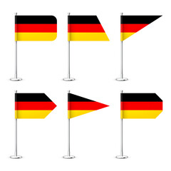 Realistic various German table flags on a chrome steel pole. Souvenir from Germany. Desk flag made of paper or fabric, shiny metal stand. Mockup for promotion and advertising. Vector illustration