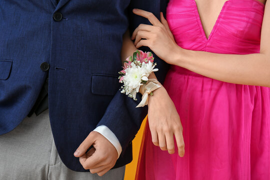 Young girl with corsage and her prom date