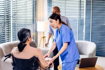 Obraz premium Portrait of smiling caring asian nurse service help support discussing and consulting taking care with senior elderly asian man and woman couple at home visit.senior retirement home care concept