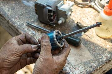 Repair of old electric motor, close up view
