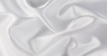 Fototapeta na wymiar Smooth elegant white silk or satin luxury cloth texture background. 
