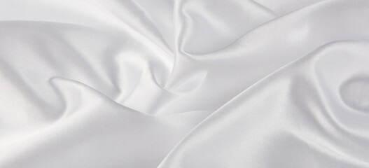 Fototapeta premium Smooth elegant white silk or satin luxury cloth texture background. 