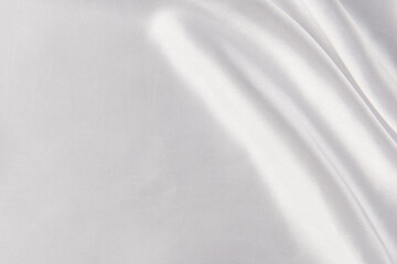 Smooth elegant white silk or satin luxury cloth texture background. 