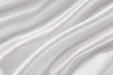 Fototapeta na wymiar Smooth elegant white silk or satin luxury cloth texture background. 