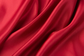 Naklejka na ściany i meble Smooth elegant red silk or satin luxury cloth texture background.