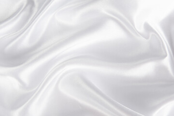 Fototapeta premium Smooth elegant white silk or satin luxury cloth texture background. 