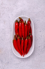 Pickled red hot peppers