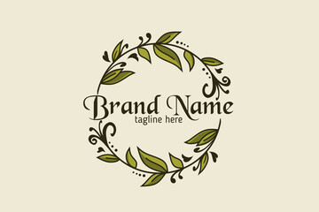 Leaf motif logo encircling the brand name