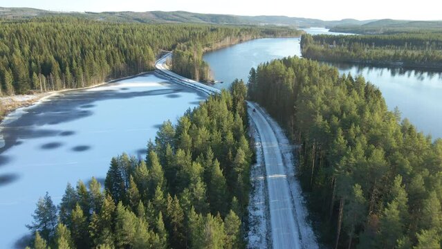 ATV driving down a icy road during winter