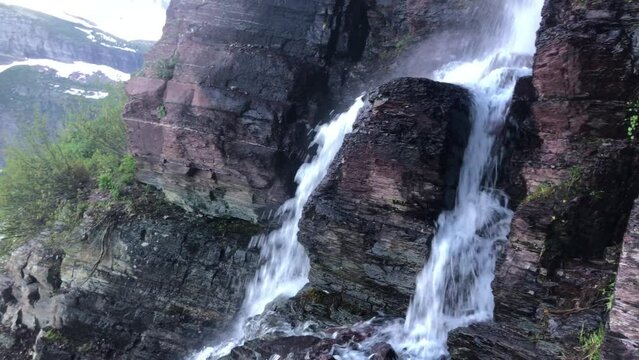 Lake and snowy mountains in Glacier National park in Montana, USA