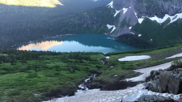 Lake and snowy mountains in Glacier National park in Montana, USA