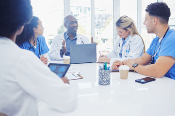 Healthcare, leader and black man in meeting, staff and brainstorming for schedule, deadline and innovation. African American male, staff or group share ideas, laptop or teamwork for procedure or cure
