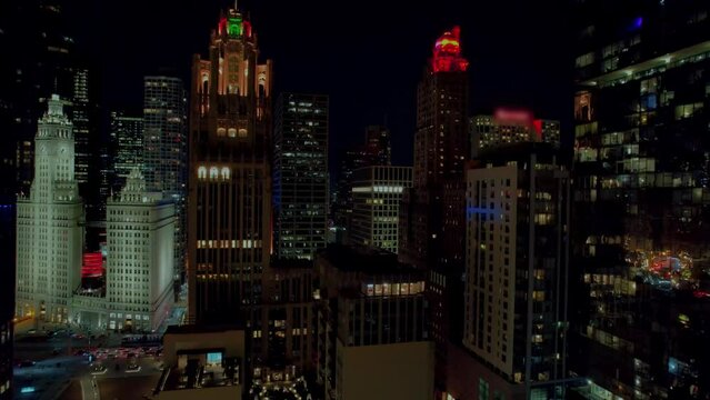Rising aerial in a fascinating place in chicago. Revealing arhitecture and urban night life in a cinematic way. Illinois USA 4k