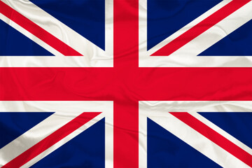 The flag of Britain on a silk background is a great national symbol. Fabric texture The official state symbol of the country. Background with British flag