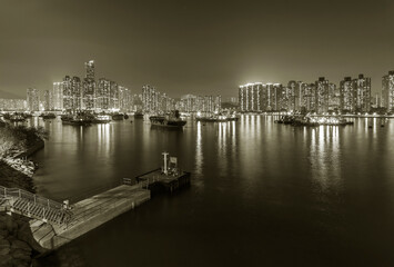 Night scenery of harbor and skyline of Hong Kong city