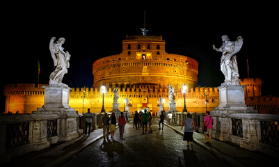 Fototapeta na wymiar Castel Saint Angelo at night. It is an enormous circular structure begun by Hadrian as a Mausoleum for himself and his family