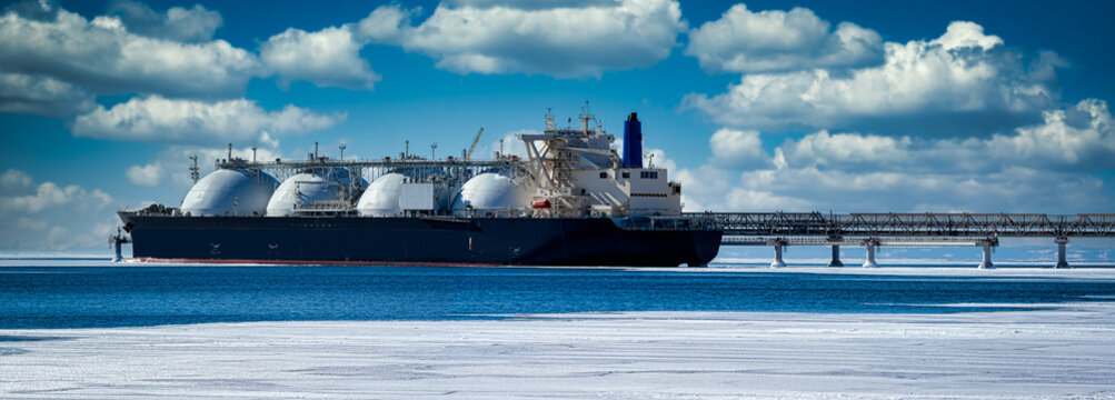 Oil and gas industry .Tanker for transportation of liquefied natural gas during loading at the LNG marine terminal.	
