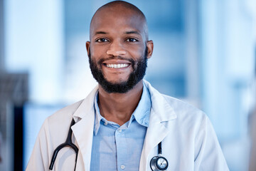 Portrait of black man doctor in healthcare career, professional service smile and hospital job mindset. Face or headshot of young medical person or cardiologist with leadership and happy opportunity