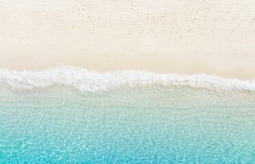 The tropical Summer with  Soft blue ocean wave on fine sandy beach  background