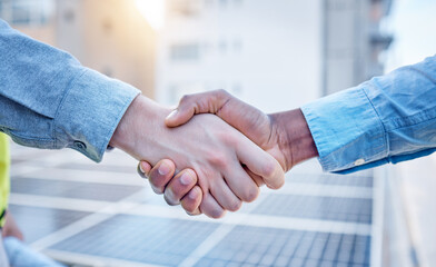 Handshake, engineering and teamwork with people and solar panels for partnership, renewable energy or deal. Agreement, sustainability and thank you with engineer shaking hands for eco, b2b or welcome © Coral N/peopleimages.com