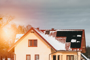 Photovoltaics installed on the roof of a house. Passive house concept. Sustainable future solar...