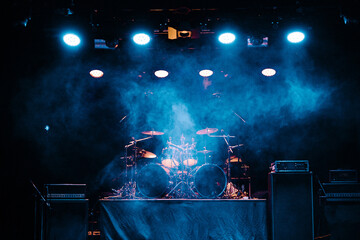 Drums on stage in smoke