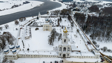 Obraz na płótnie Canvas panoramic view from a drone on the ancient monastery of St. Yuriev in Veliky Novgorod on a winter day