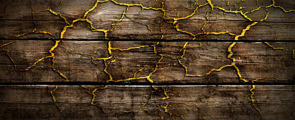 Dark wood floor boards vintage with golden burning volcanic lines