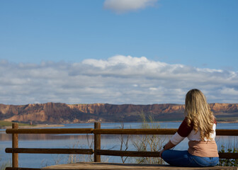 
woman meditating in nature