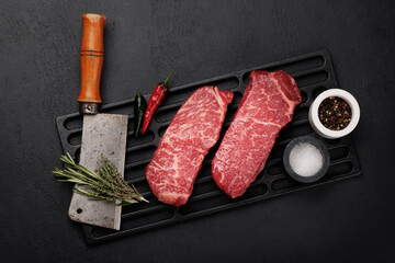 Prime marbled beef steaks. Raw striploin steak